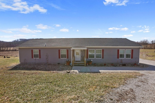 ranch-style house with a front yard