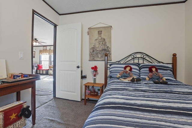 bedroom with crown molding and carpet flooring