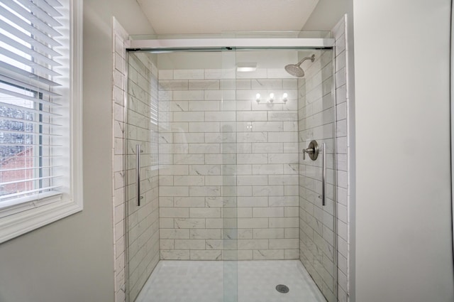 full bathroom featuring a stall shower