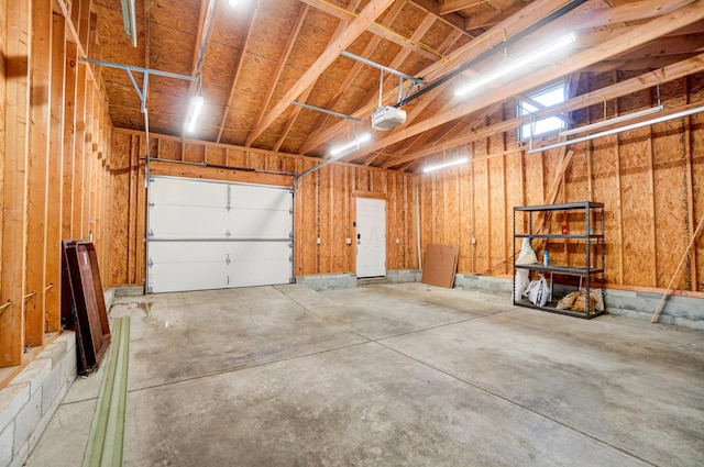 garage featuring a garage door opener