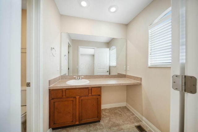 bathroom featuring recessed lighting, visible vents, vanity, baseboards, and tile patterned floors