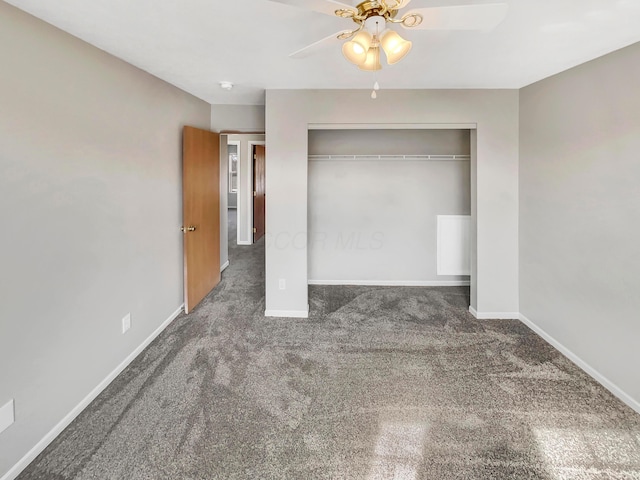 unfurnished bedroom featuring carpet, a closet, ceiling fan, and baseboards