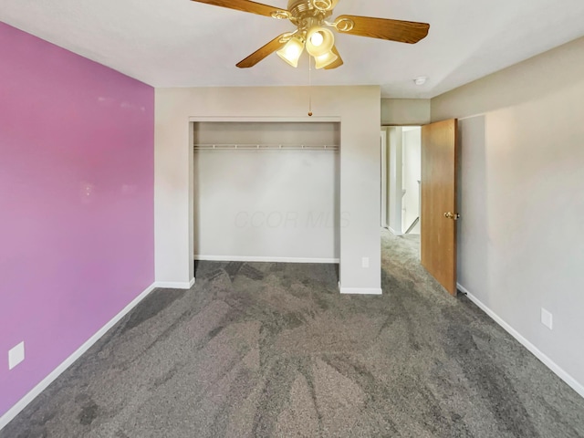 unfurnished bedroom with a ceiling fan, a closet, carpet flooring, and baseboards