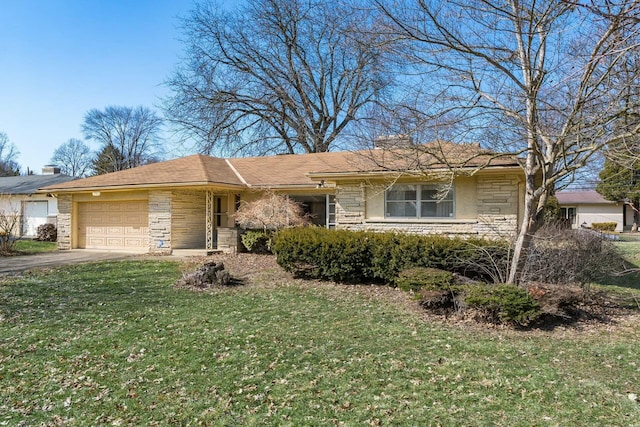 ranch-style house featuring a garage, a front yard, stone siding, and driveway