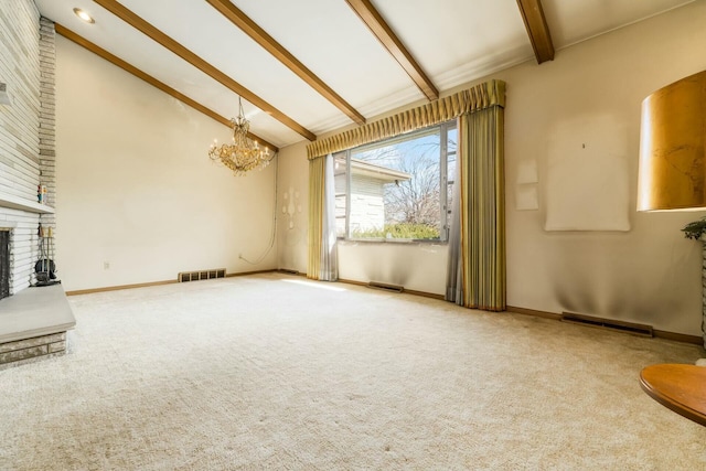 unfurnished living room with visible vents, beamed ceiling, carpet floors, a brick fireplace, and high vaulted ceiling