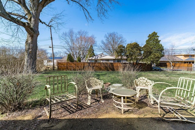 view of yard with fence