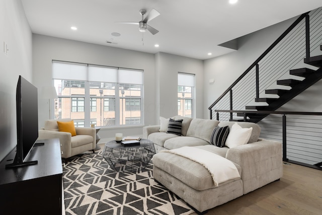 living room with recessed lighting, stairs, ceiling fan, and wood finished floors