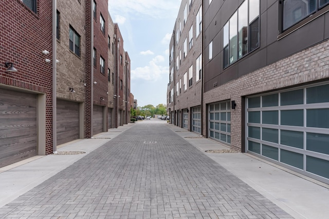 view of street with community garages