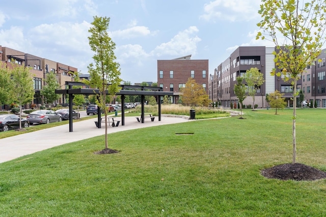 surrounding community featuring a lawn