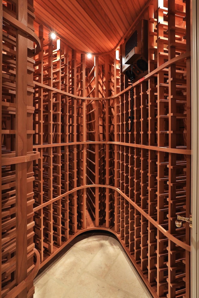 wine room with wood ceiling