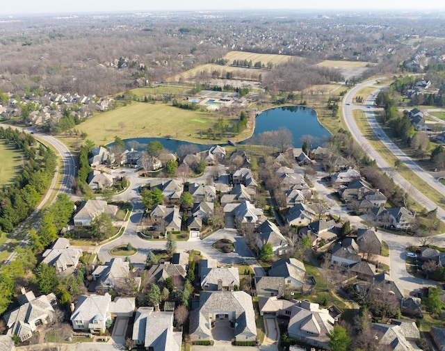 aerial view with a residential view and a water view