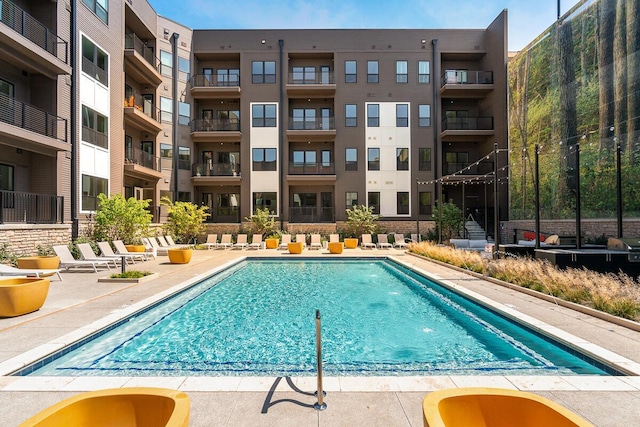 community pool with a patio