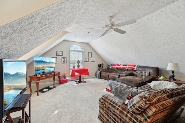 living area with lofted ceiling, carpet floors, and a textured ceiling