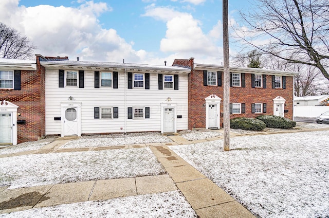 multi unit property featuring brick siding