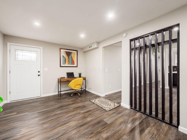 home office with recessed lighting, wood finished floors, visible vents, and baseboards