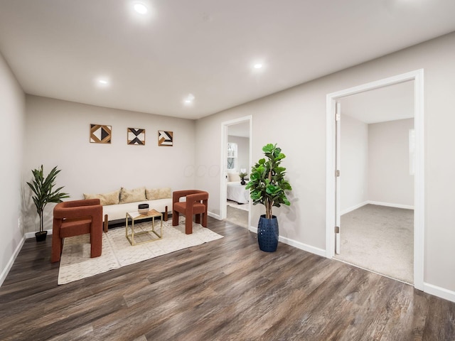 interior space with recessed lighting, wood finished floors, and baseboards