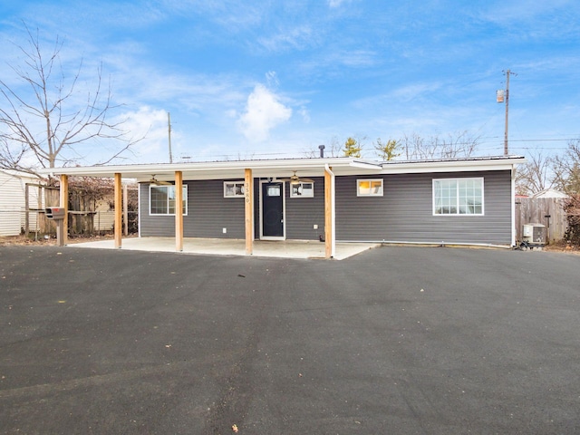 view of front of house with fence