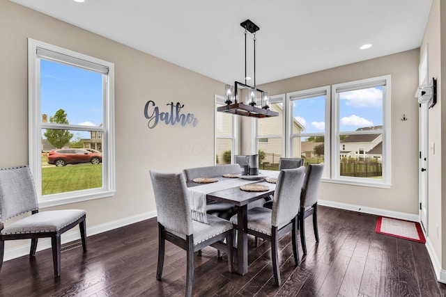 7179 Seymour Ct, Canal Winchester, OH 43110 - dining space with healthy amount of natural light, dark wood-style flooring, recessed lighting, and a chandelier