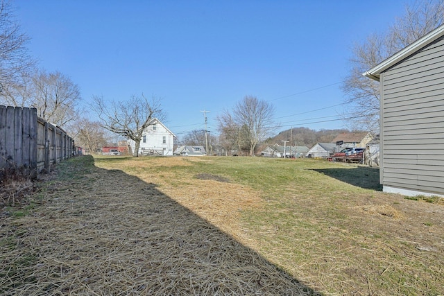 view of yard with fence