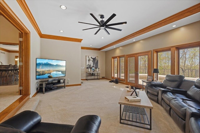 carpeted living room with a ceiling fan, ornamental molding, recessed lighting, and baseboards