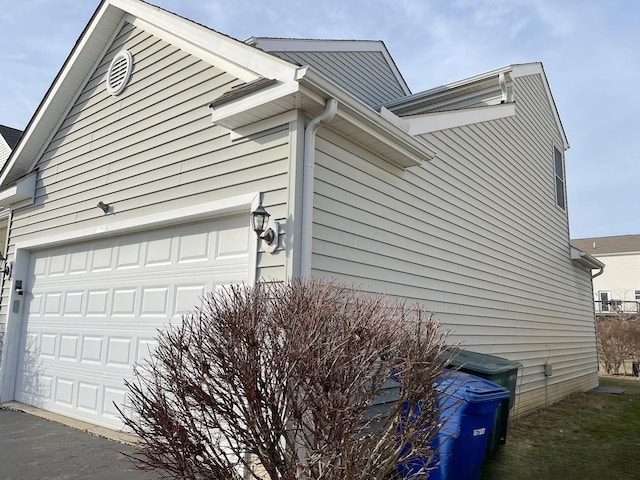 view of home's exterior featuring an attached garage