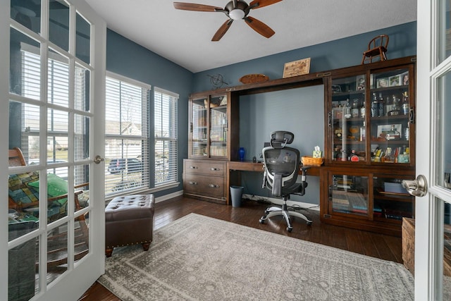 office space with a ceiling fan, hardwood / wood-style flooring, and french doors