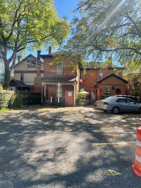 view of front of property featuring a chimney