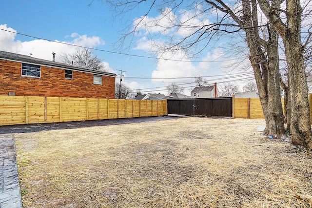 view of yard featuring fence