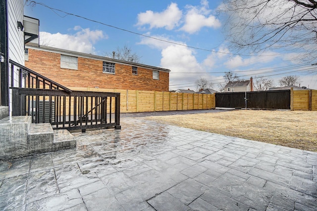 view of patio with fence