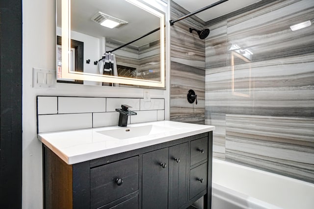 full bath with shower / bathtub combination with curtain, backsplash, and vanity