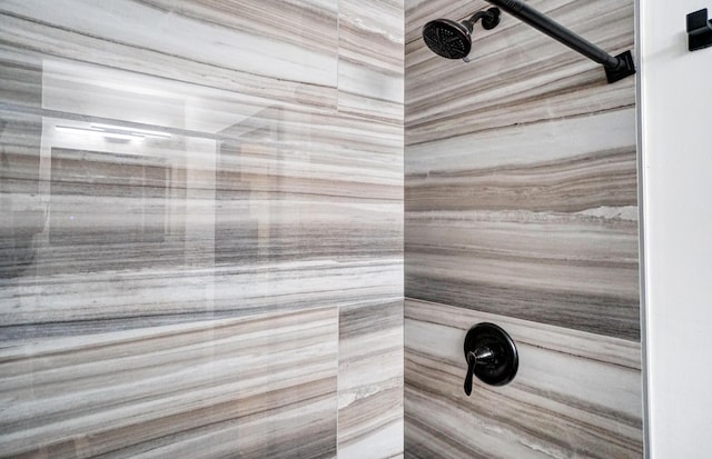 room details with a tile shower