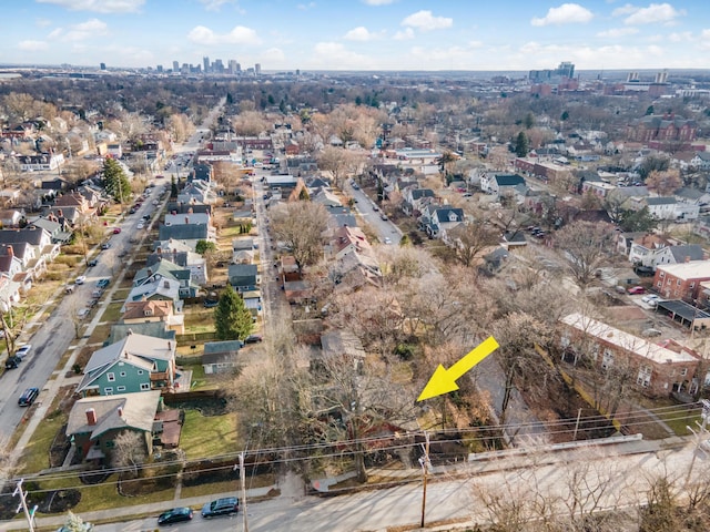 birds eye view of property featuring a city view