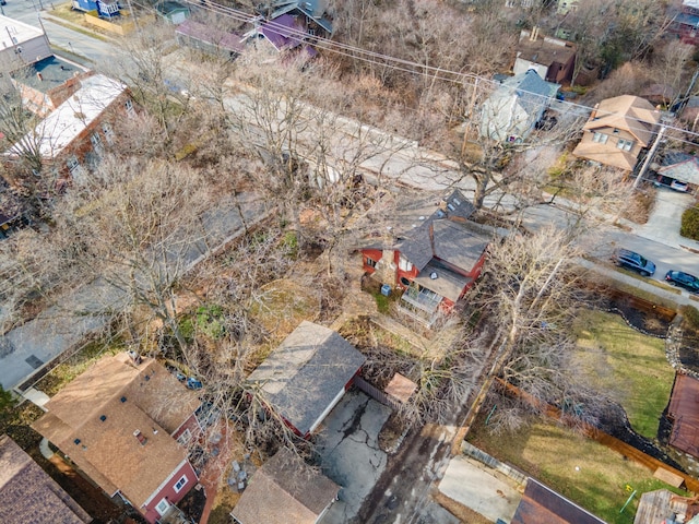 birds eye view of property with a residential view