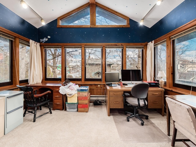 office with a baseboard heating unit, lofted ceiling, light carpet, and rail lighting