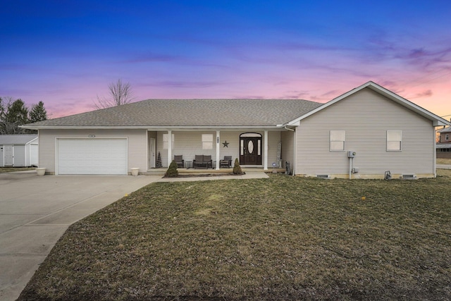 single story home with a porch, an attached garage, a shingled roof, concrete driveway, and a lawn