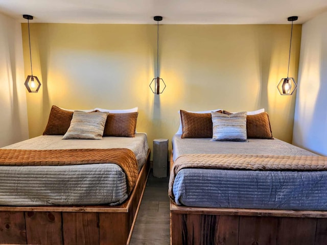 bedroom featuring wood finished floors