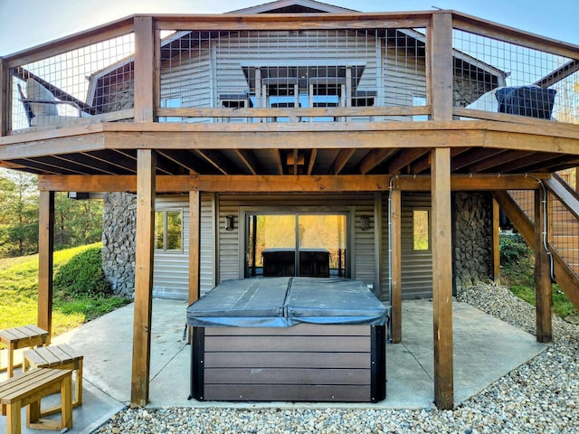 view of patio with a hot tub