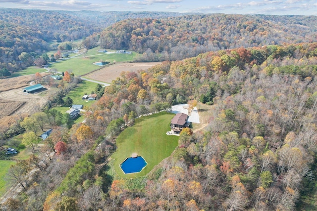 aerial view with a wooded view