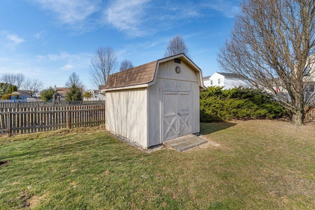 view of shed with fence