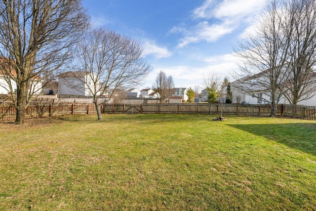 view of yard featuring a fenced backyard