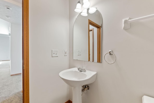 bathroom featuring baseboards