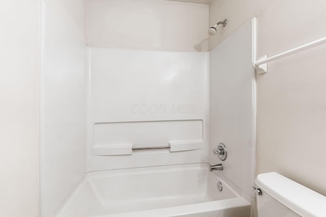 full bath with shower / tub combination and toilet