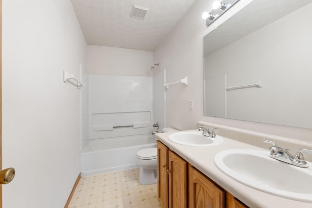 full bath featuring toilet, visible vents, a sink, and tile patterned floors