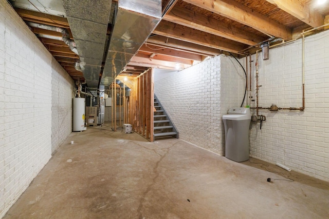 unfinished basement featuring water heater, brick wall, stairway, and heating unit