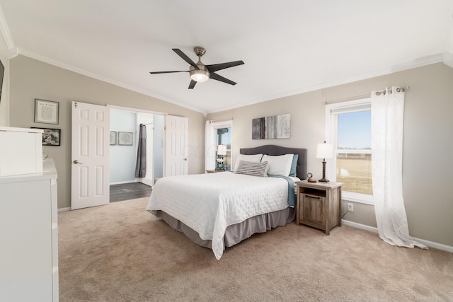 bedroom featuring baseboards, light carpet, and ornamental molding