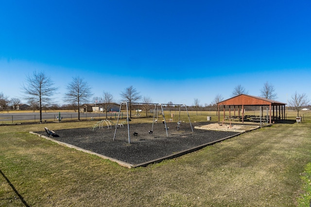 community playground featuring a yard