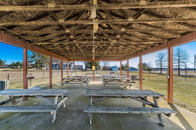 surrounding community featuring a patio area and a lawn