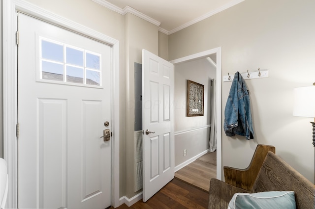 interior space with dark wood-style floors, visible vents, crown molding, and baseboards