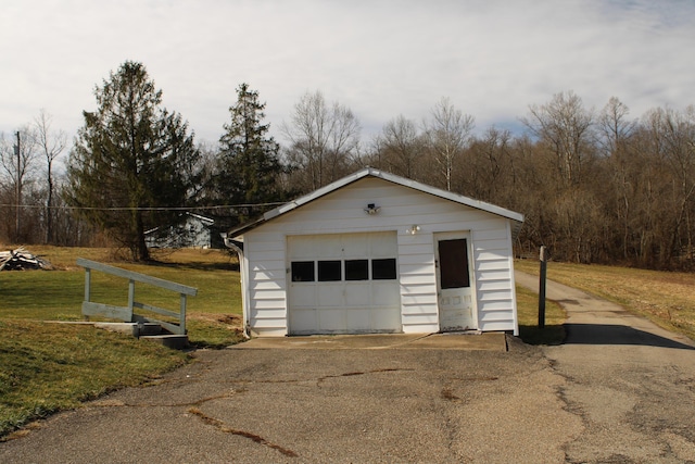 detached garage with driveway