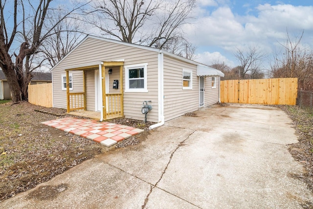 view of front of home with fence